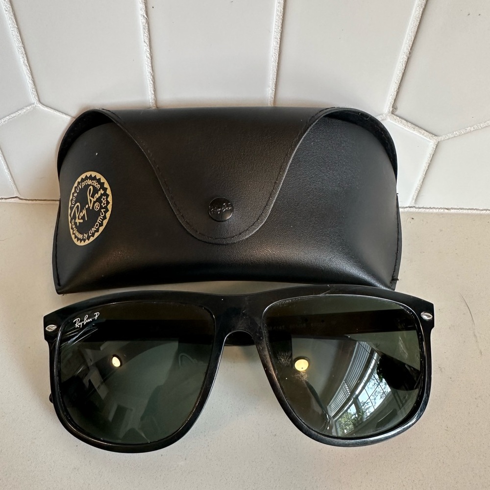 All black Rayban oversized aviators